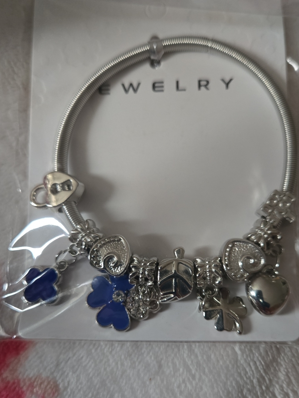 Silver Tone Charm Bracelet with Blue Flower Accents